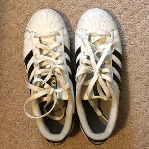 black adidas superstars